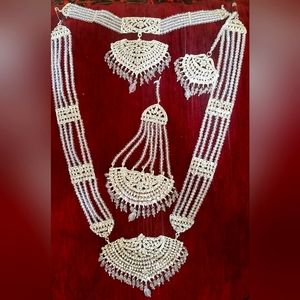 Indian Large bridal pendant and choker set with earrings and hair accessories.